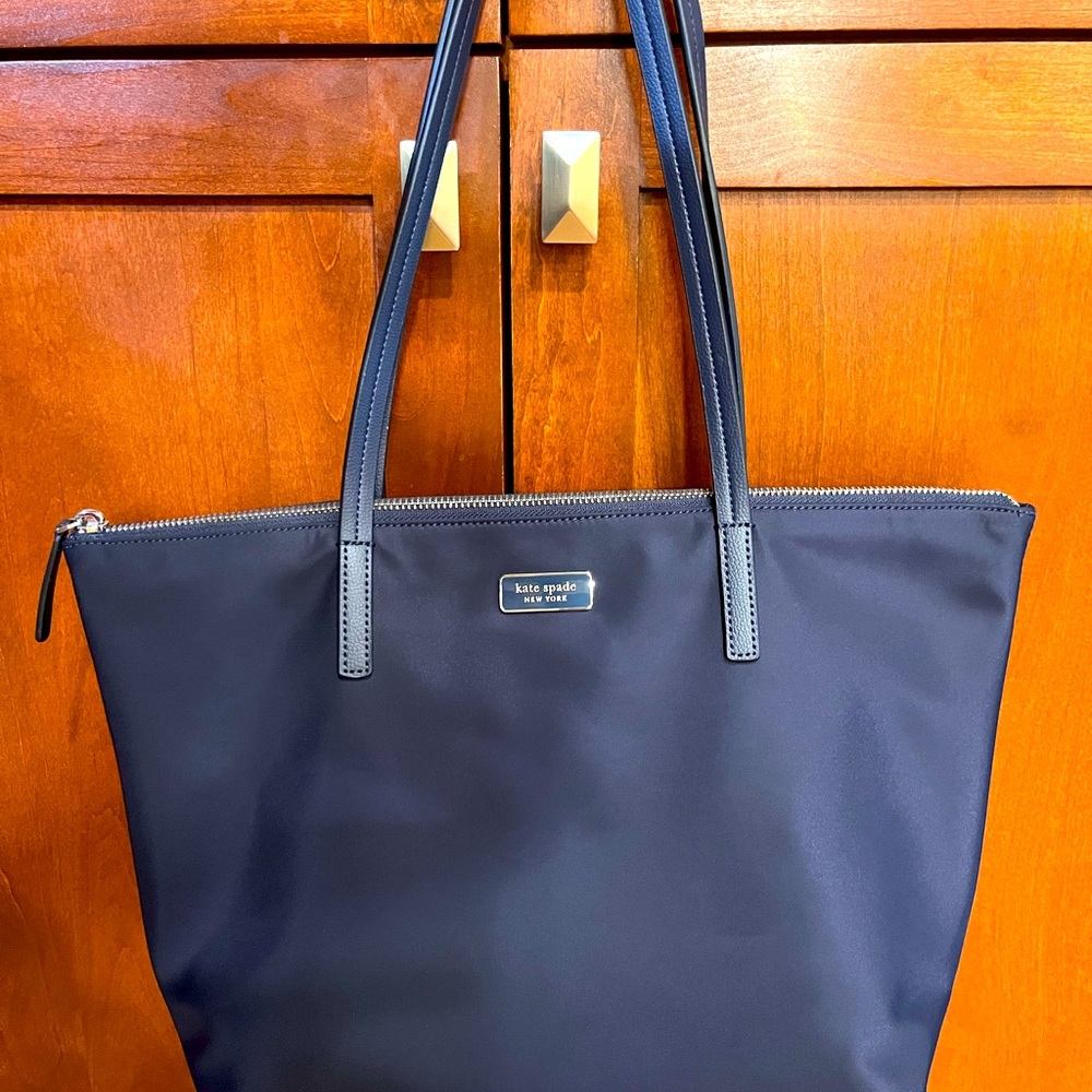 NWT - Kate Spade Navy Blue Tote and cosmetic bag.